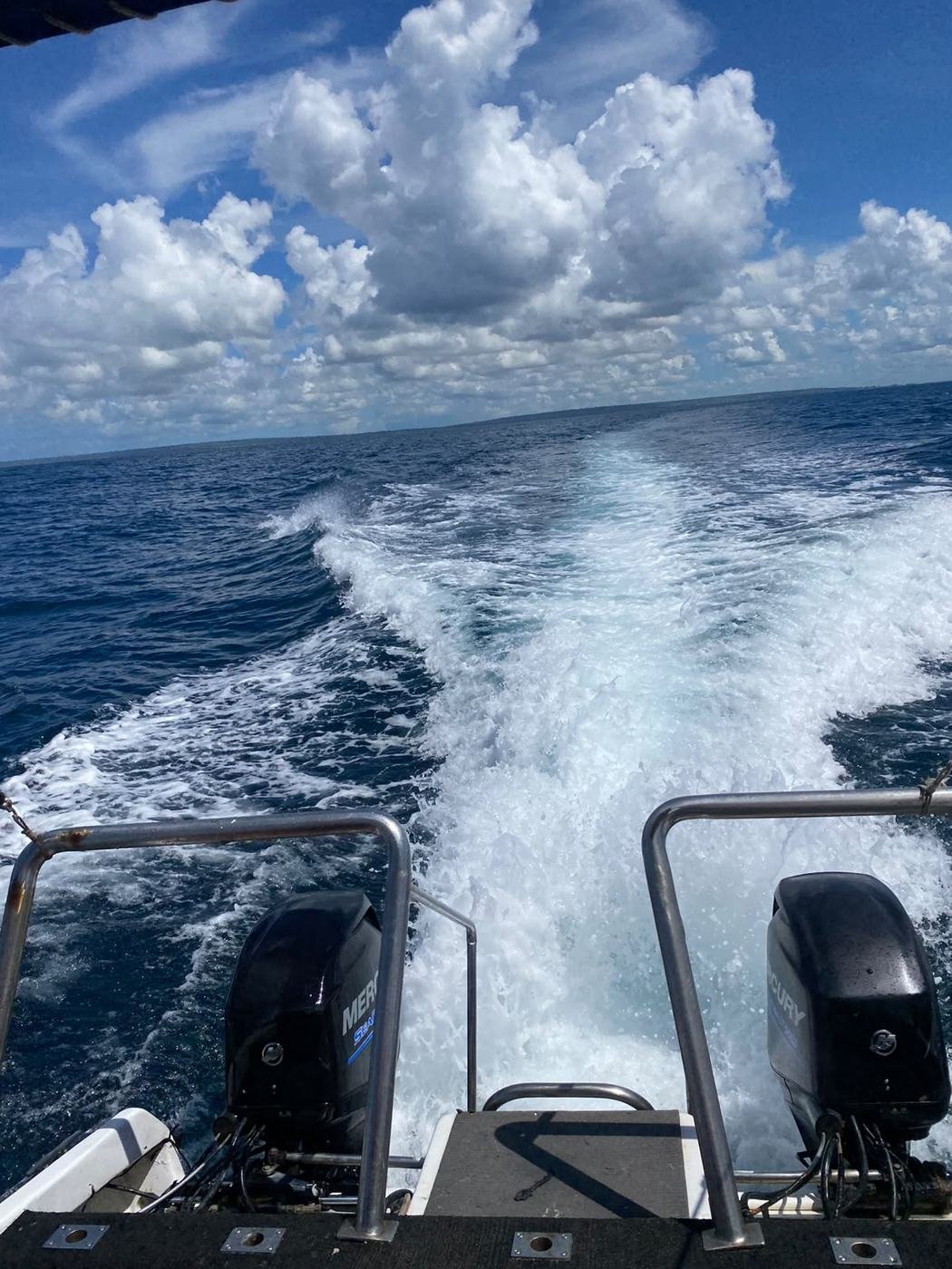 Launch under way, seen from the stern