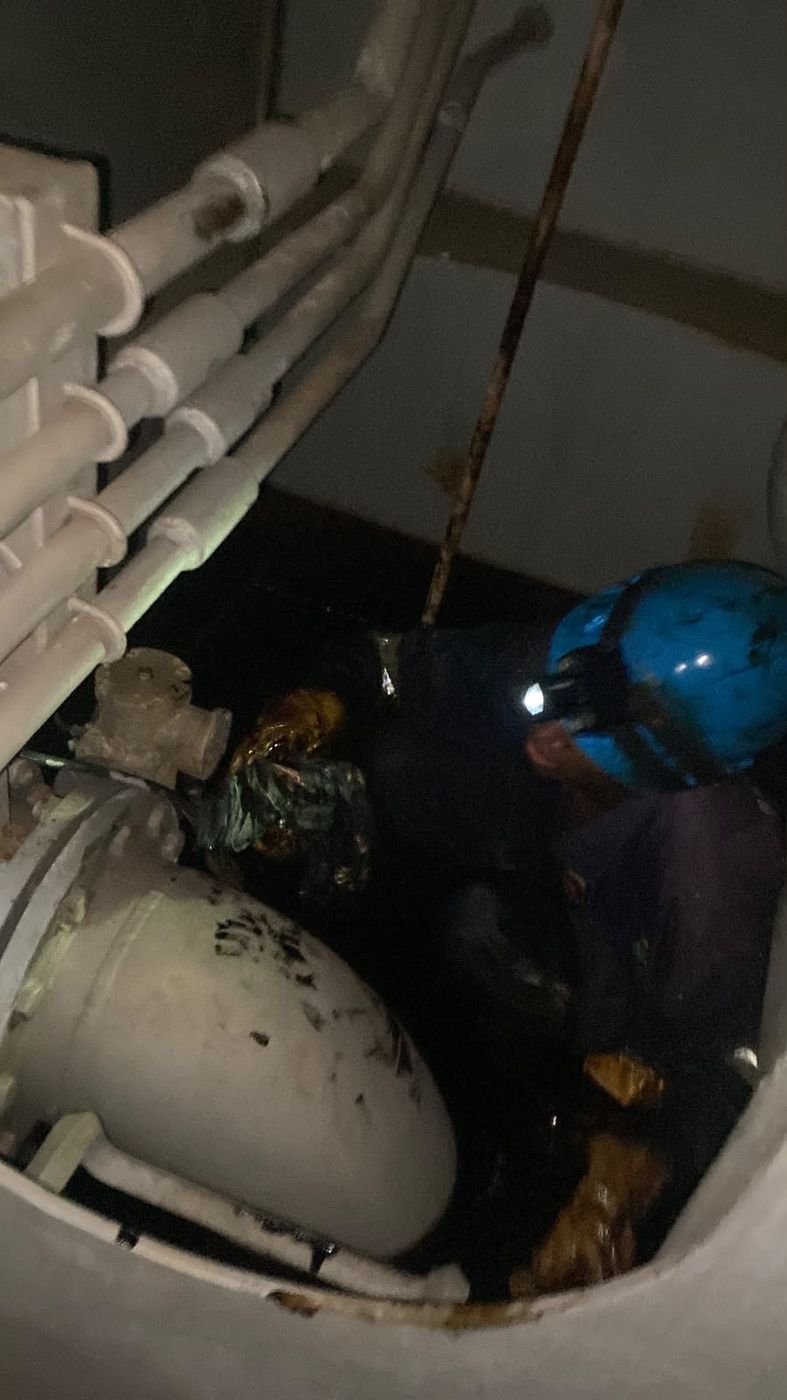 Inside a tank during cleaning