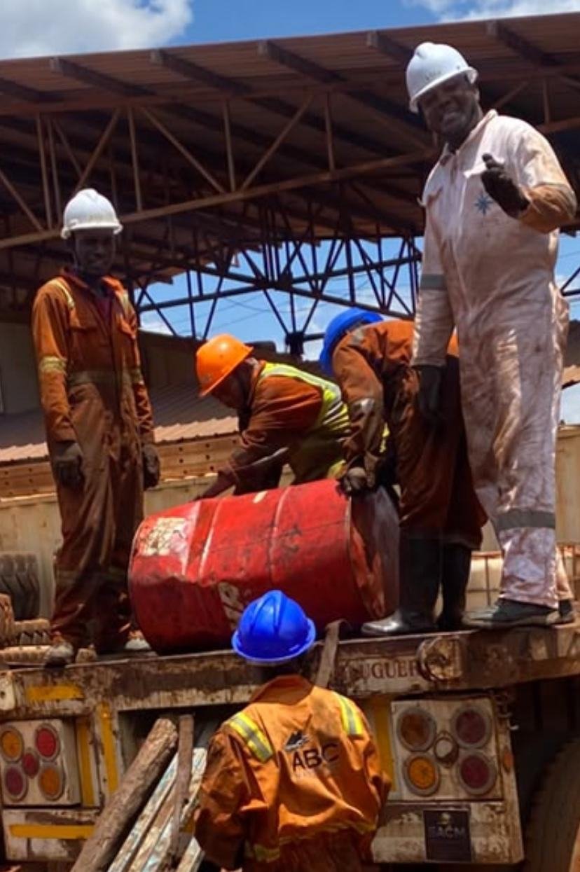 Crew loading drums