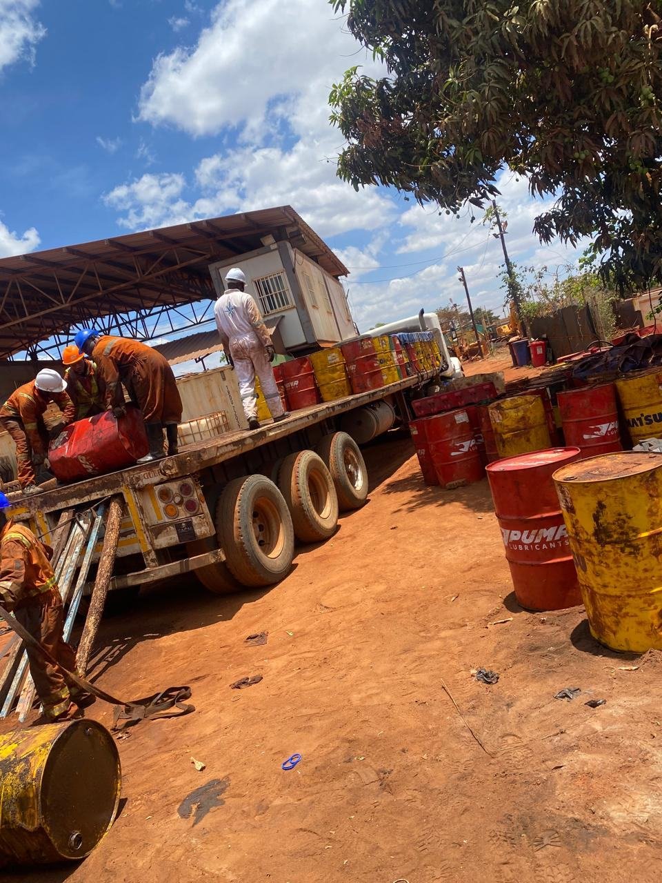 Loading drums onto a truck